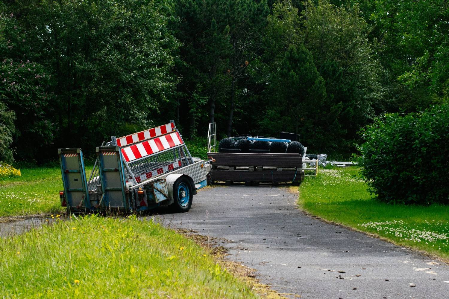 utility trailers on a rural road